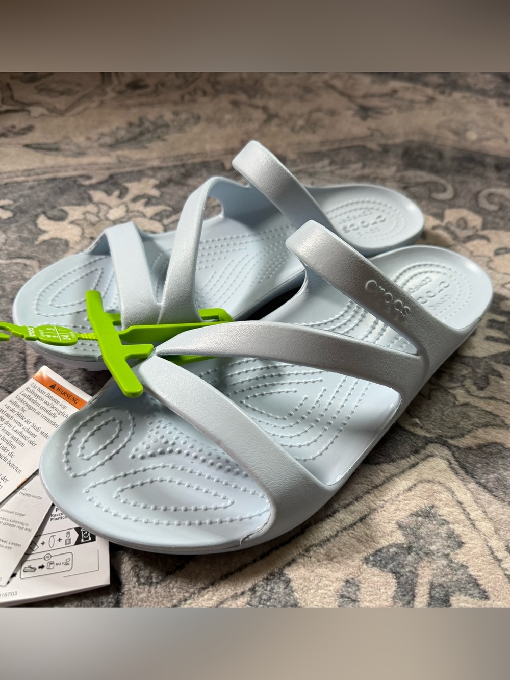 CROCS woman’s size 9 light blue Cross-Strap Slide Sandals